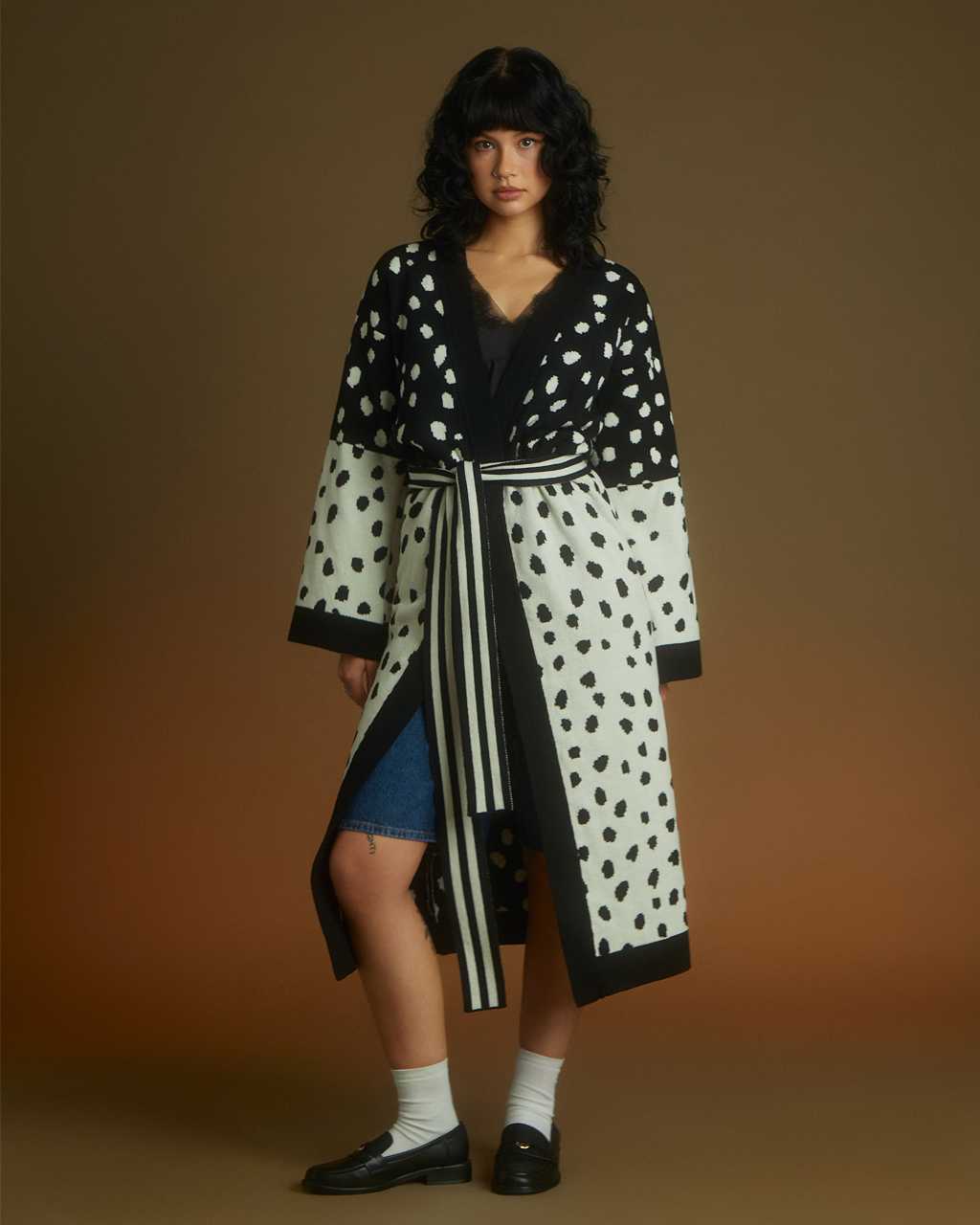 Women wearing an INGMARSON  carddigan in black and white 